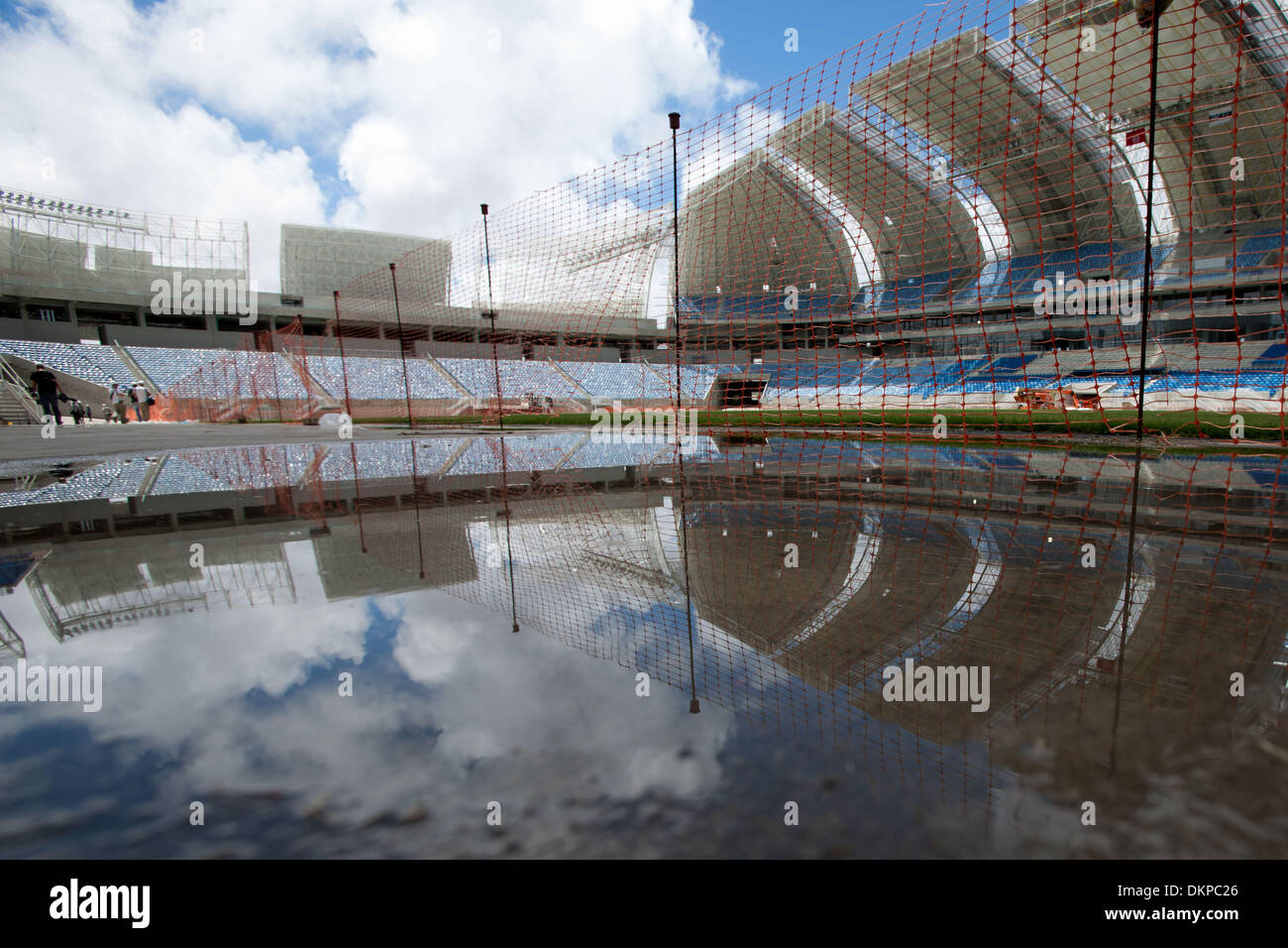 (131209) -- NATAL, Dec. 9, 2013 (Xinhua) -- Photo taken on Dec. 8, 2013 shows the interior view of Arena das Dunas in Natal, Rio Grande do Norte, Brazil. Arena das Dunas, which is scheduled to finish the reformation on Jan. 14, 2013, will hold four group matchs during the 2014 World Cup. (Xinhua/Xu Zijian) Stock Photo