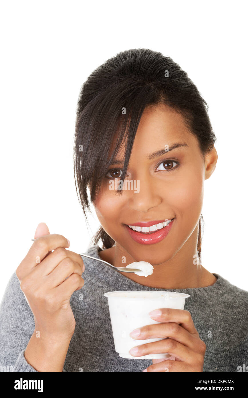 Young woman eating yogurt model hires stock photography and images Alamy