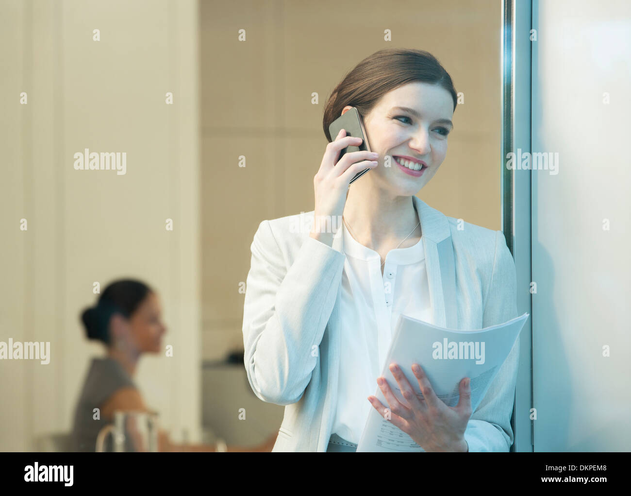Businesswoman talking on cell phone Stock Photo