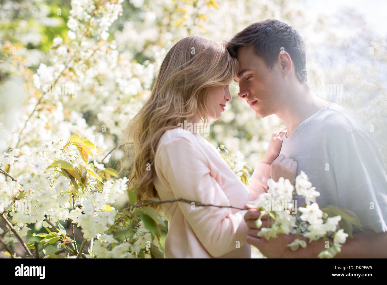 Couple hugging outdoors Stock Photo - Alamy