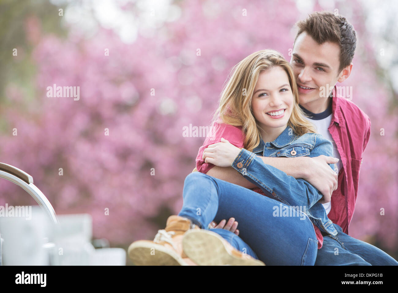 Couple hugging outdoors Stock Photo - Alamy