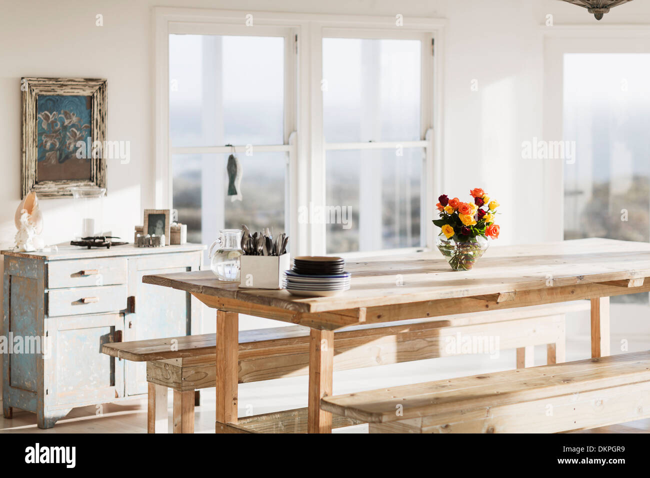 Wooden table in dining room Stock Photo