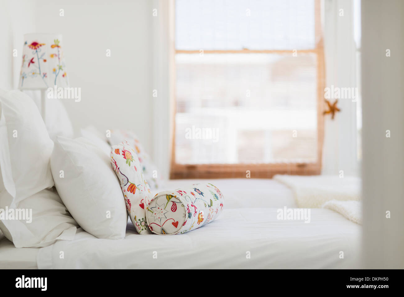 Large Bed White Furry Blanket Pillows Upholstered Panel Headboard Colorful  Stock Photo by ©anastasiagorova.gmail.com 314558246