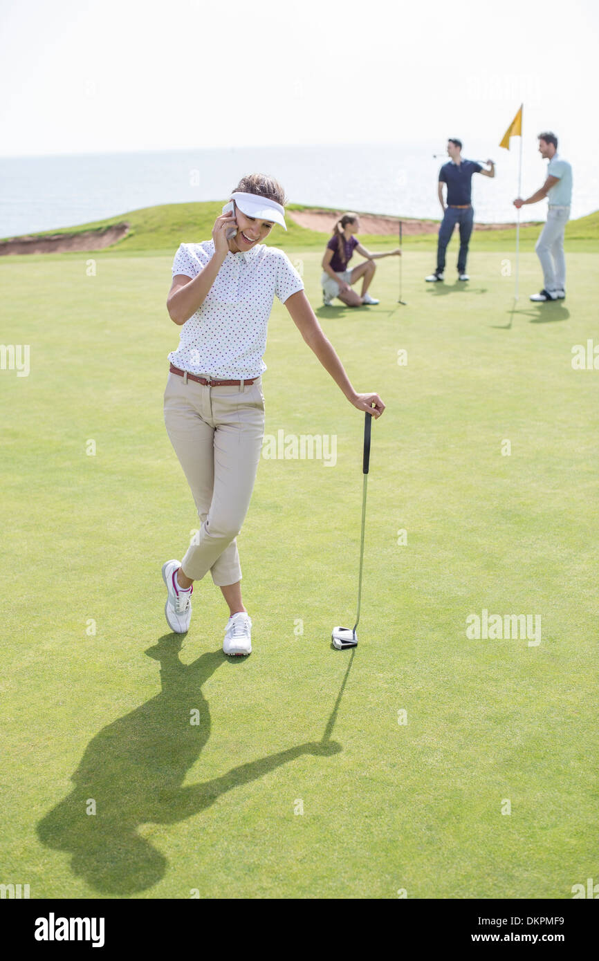 Golfer using cell phone hires stock photography and images Alamy