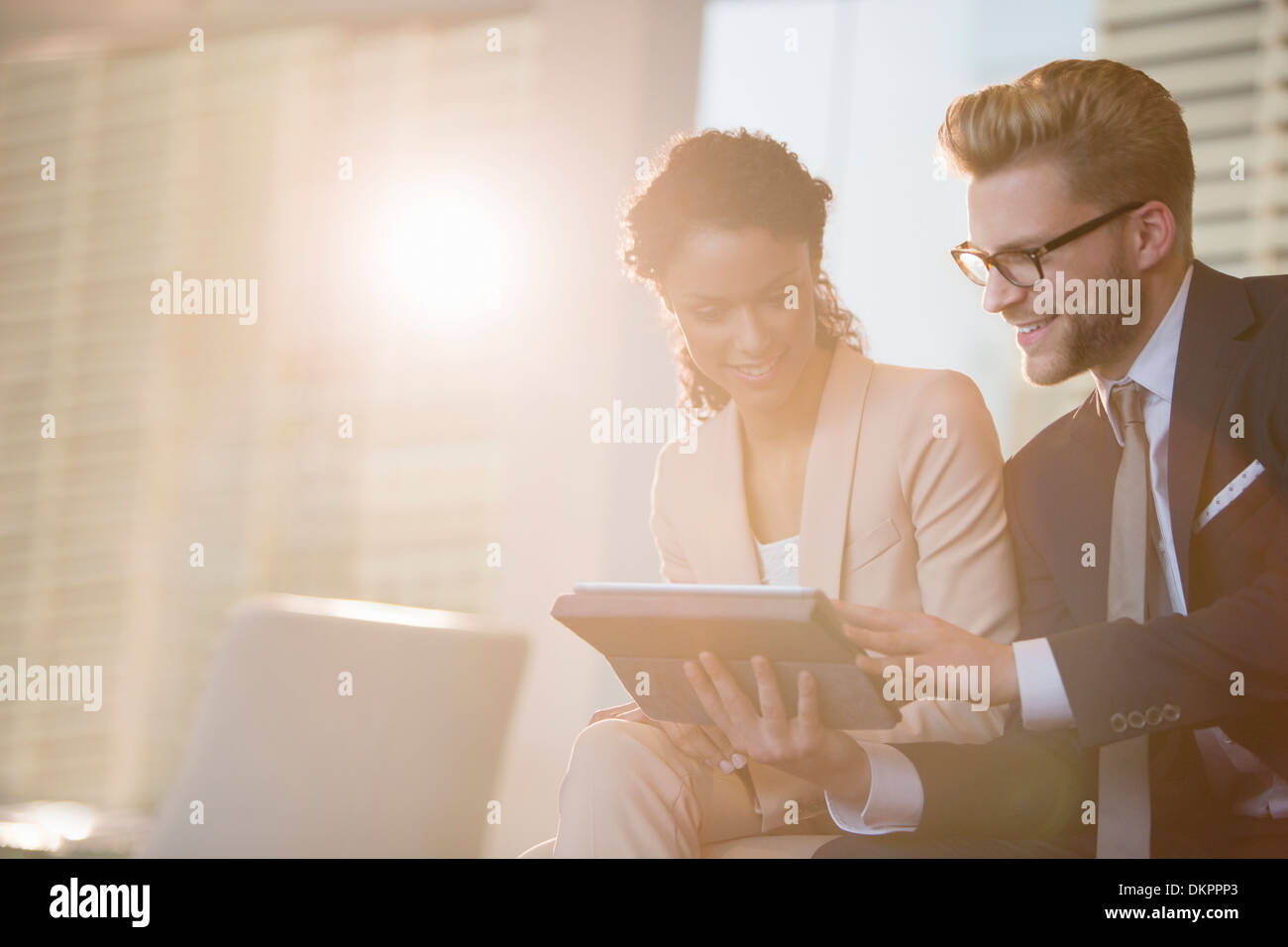 Business people using digital tablet in office Stock Photo