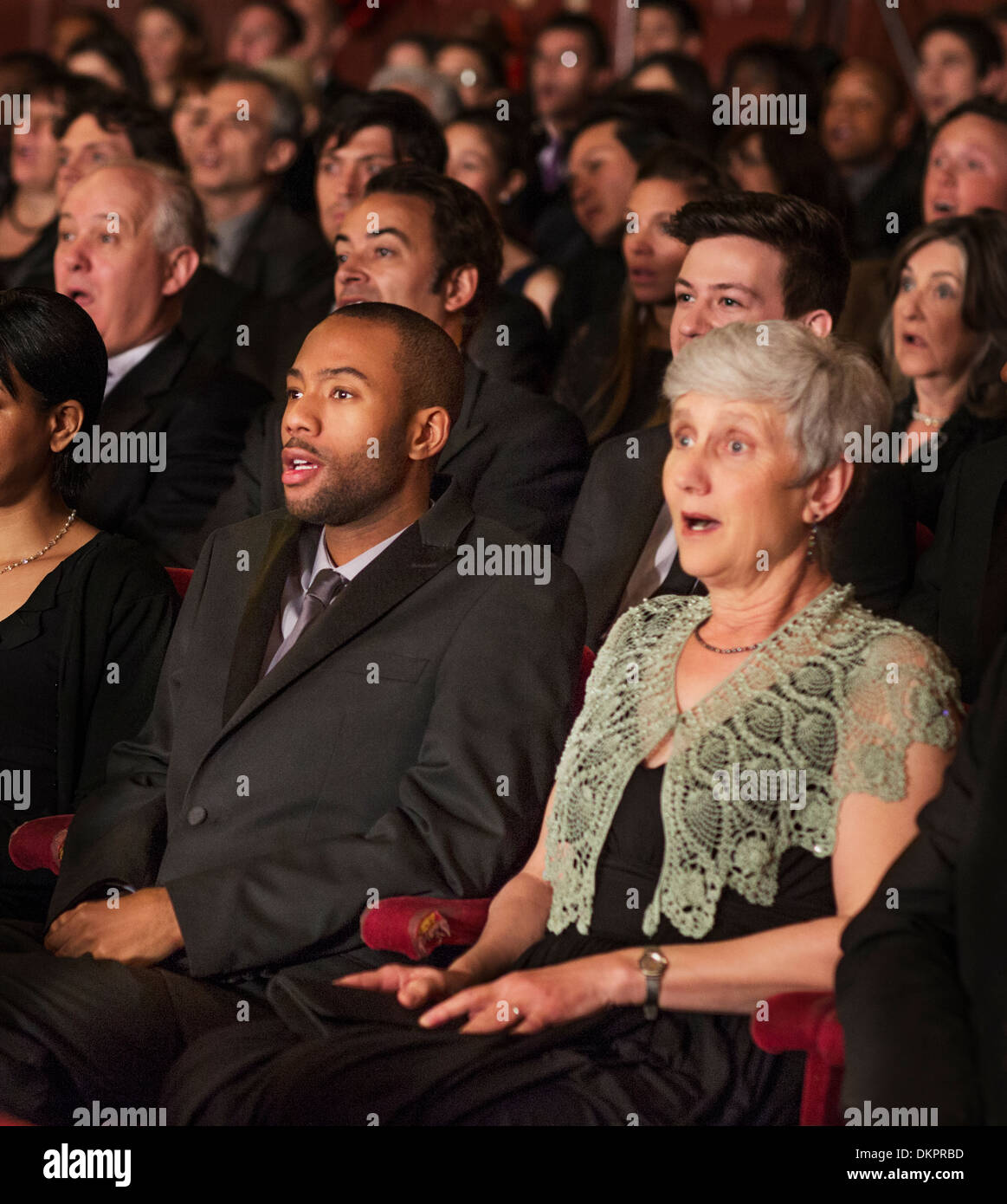 Surprised theater audience Stock Photo