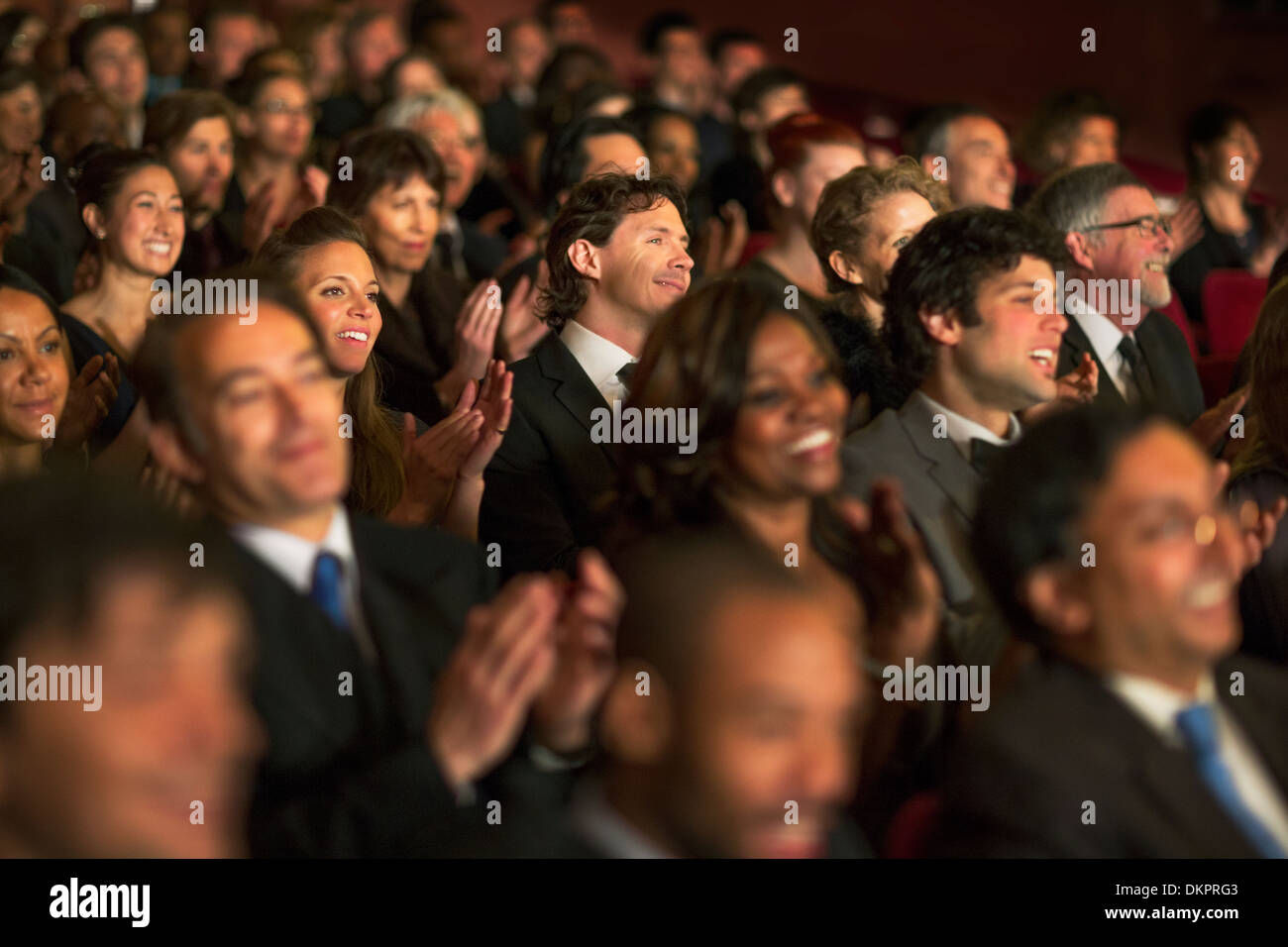 Clapping theater audience Stock Photo