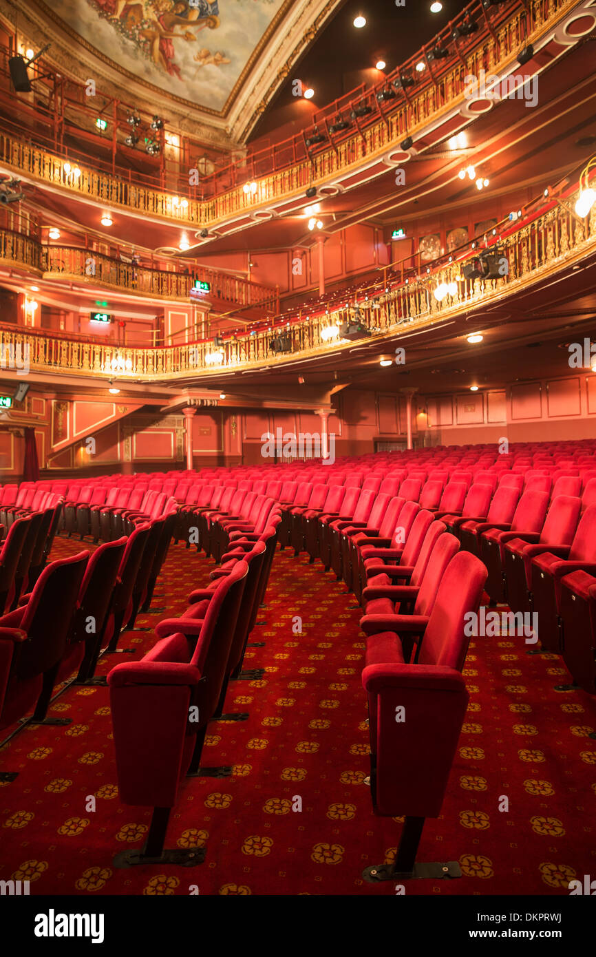 Balconies and seats in empty theater auditorium Stock Photo