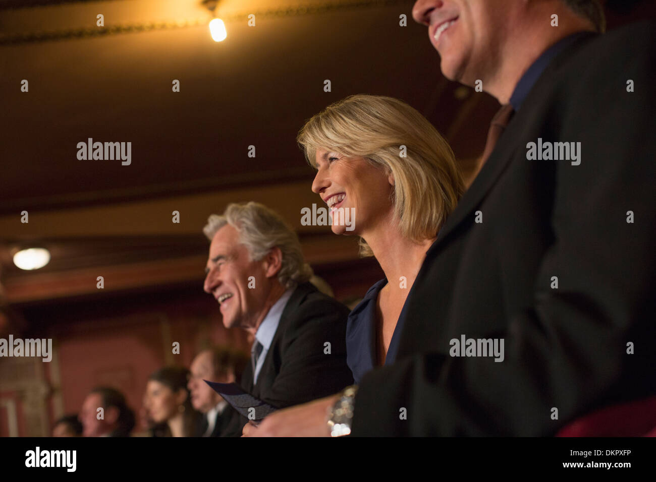Smiling theater audience Stock Photo