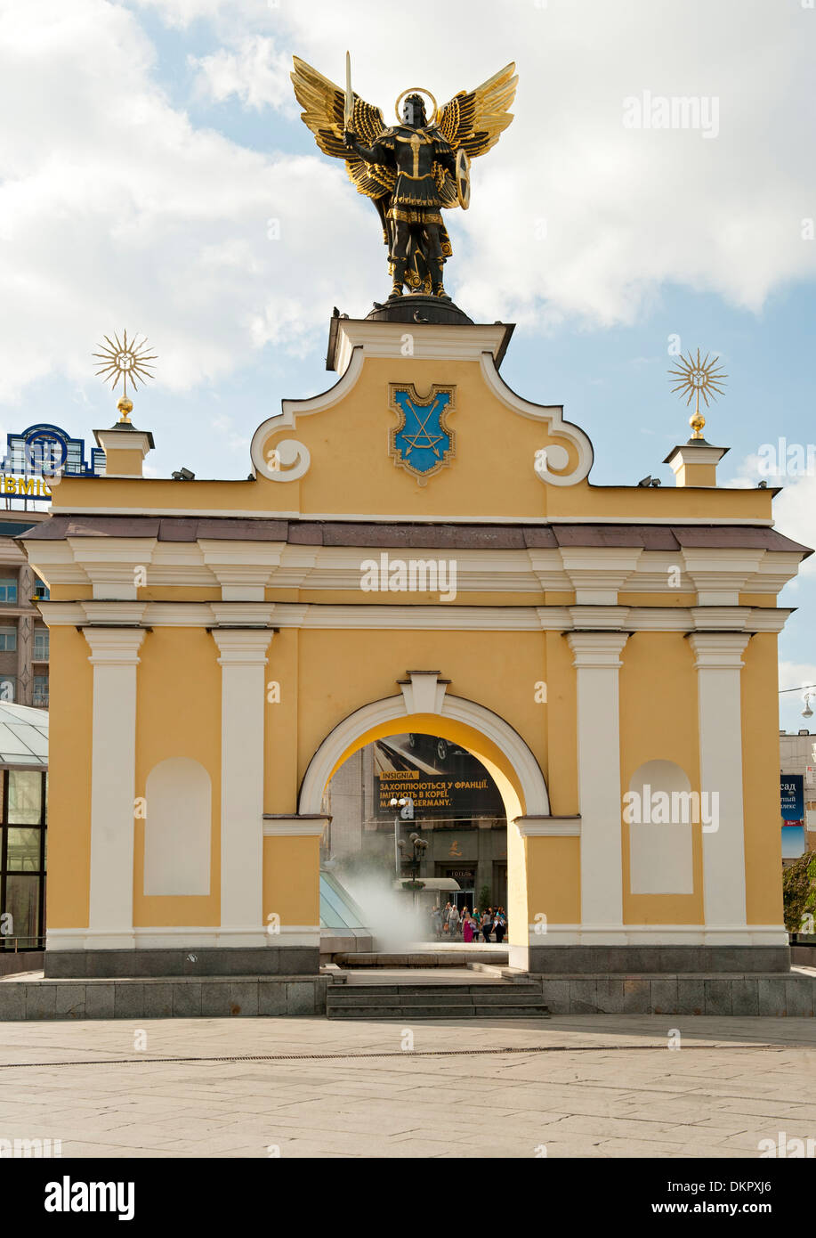 Pecers'kyj gate in Independence Square (Maidan Nezalezhnosti) in Kiev, the capital of Ukraine. The statue is of archangel Mikhai Stock Photo