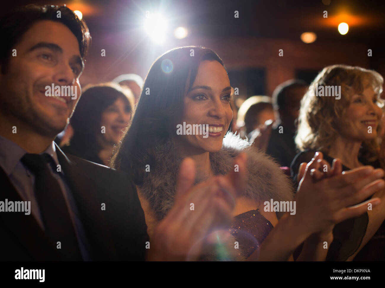 Close up of clapping theater audience Stock Photo