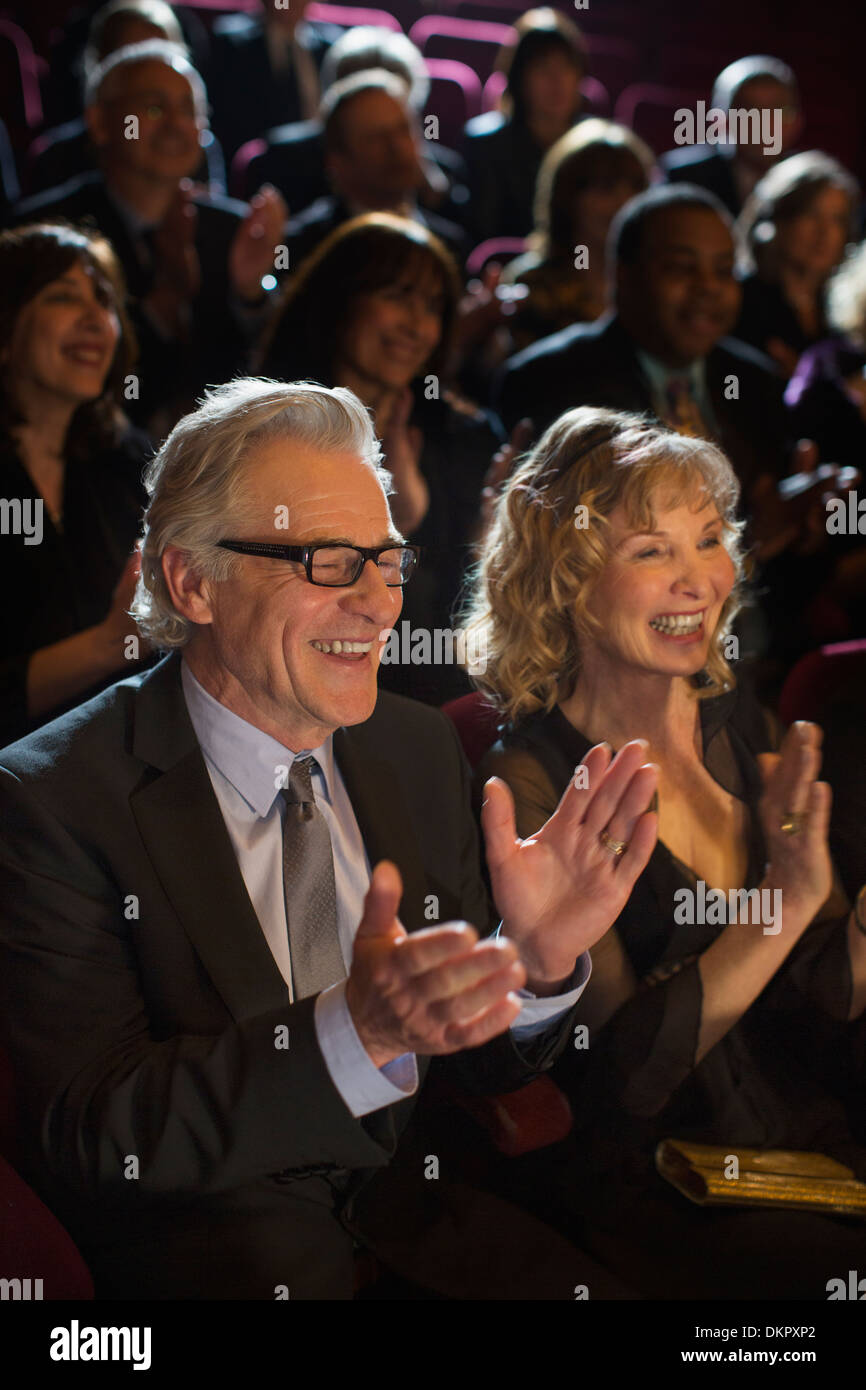 Clapping theater audience Stock Photo