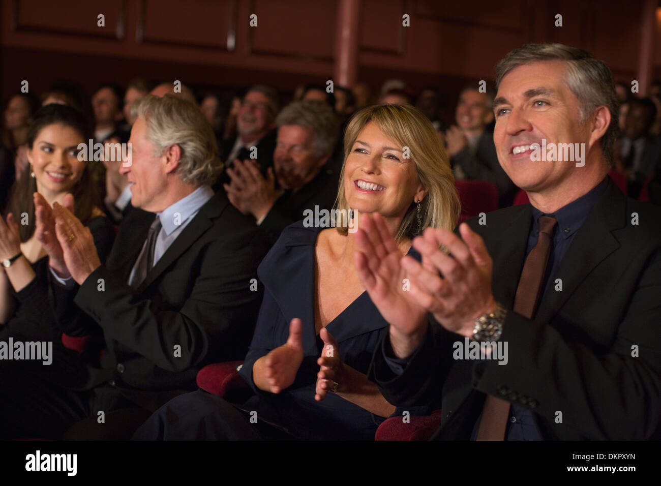 Clapping theater audience Stock Photo