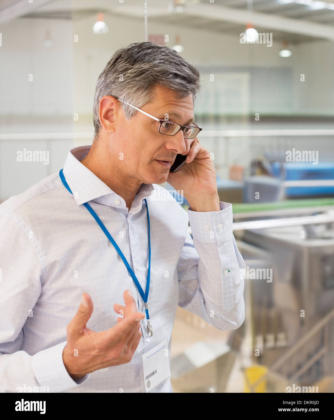 Businessman talking on cell phone Stock Photo