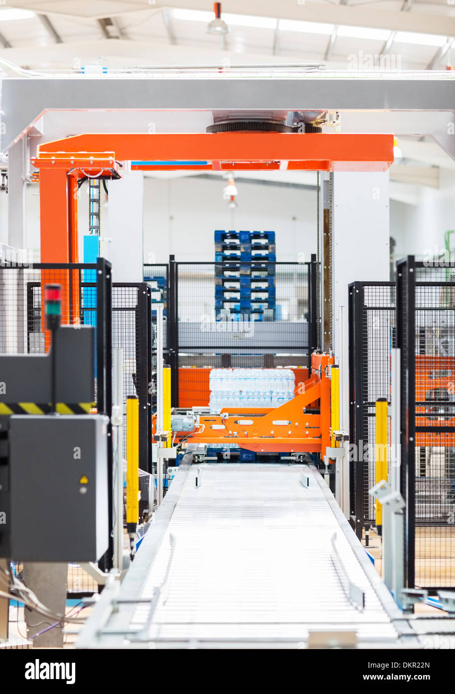 Bottled water on production line in factory Stock Photo