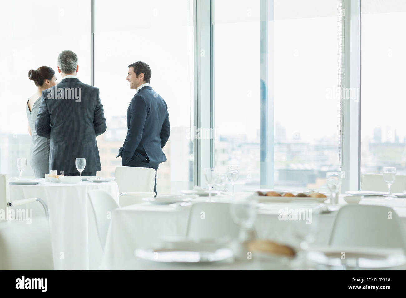 Business people talking in restaurant Stock Photo