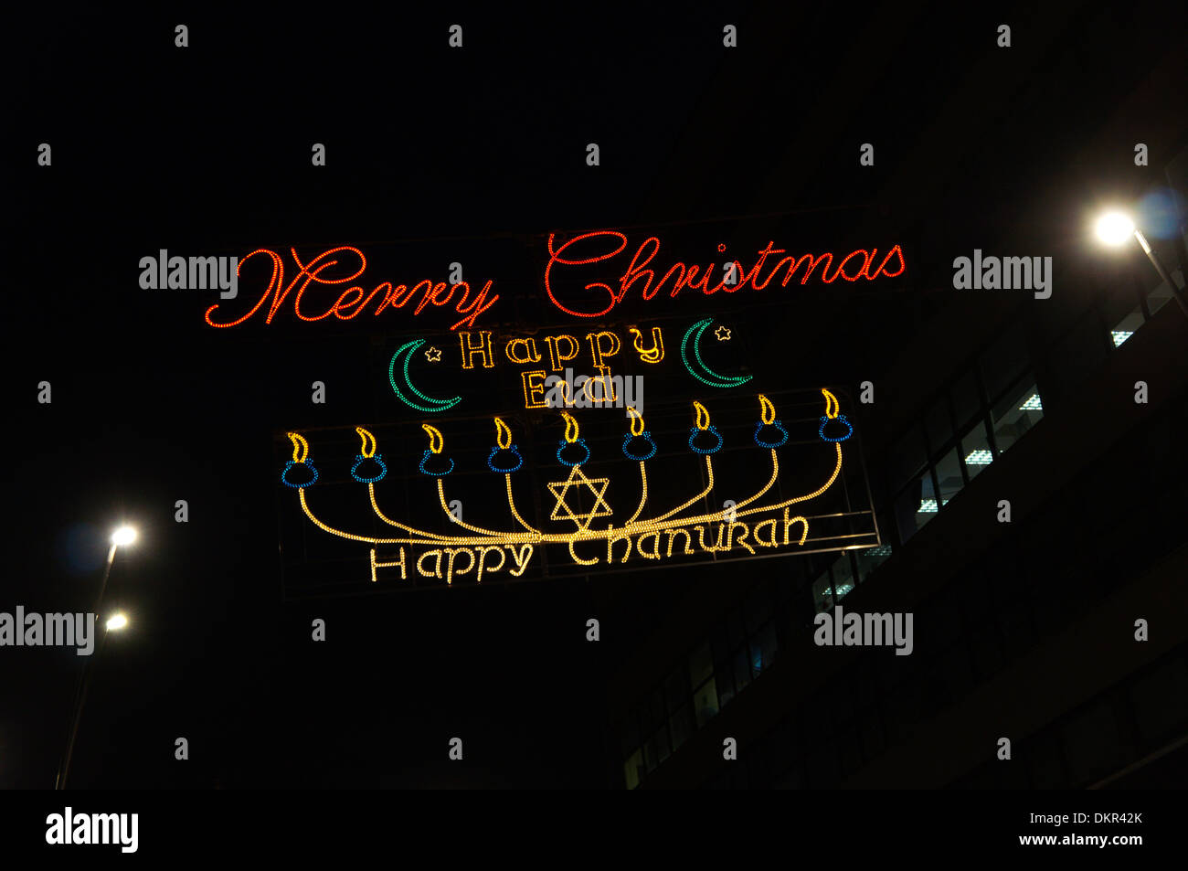 Decorative lights in Sheffield celebrating Christmas, Eid and Chanukah. Stock Photo