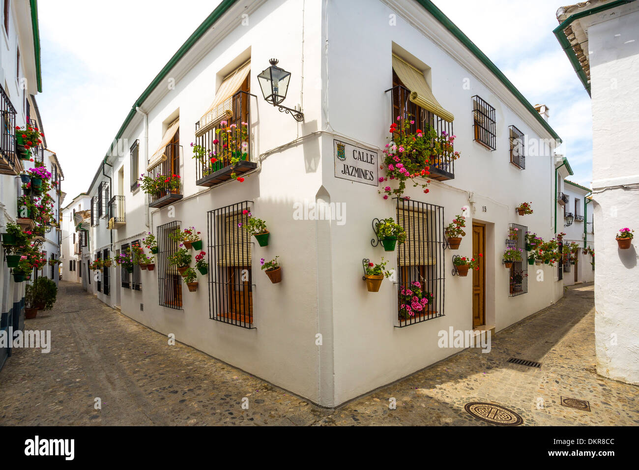 Spain Europe Andalucia Region Cordoba Province Priego de Cordoba City Old City Cordoba architecture flowers patio spring street Stock Photo