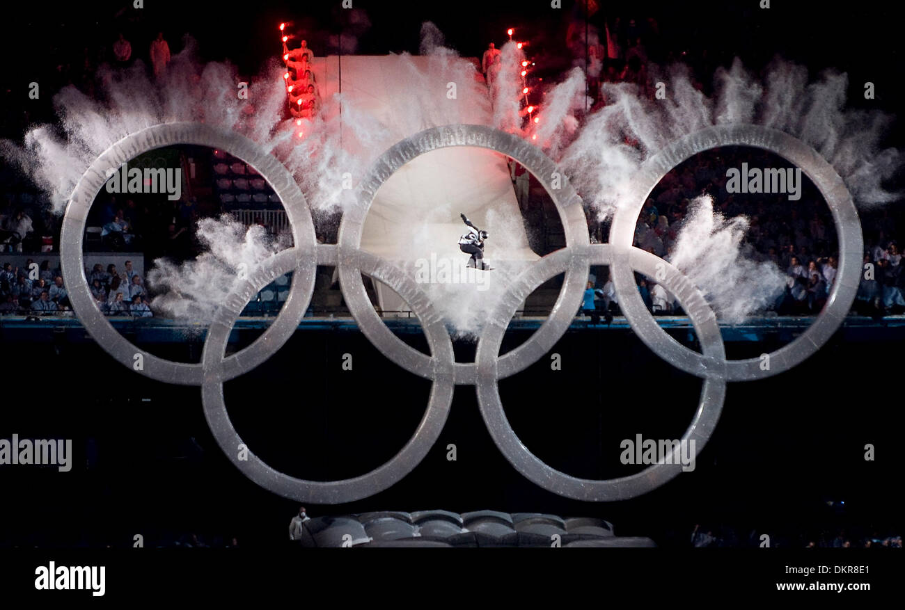 Feb. 12, 2010 - Vancouver, British Columbia, Canada - OLYMPICS OPENING CEREMONY - Snowboarder flies though the center rings of the Olympics circle during the Fire on the Mountain program at the XXI Winter Olympic opening ceremonies at the BC Palace. (Credit Image: © Paul Kitagaki Jr./ZUMApress.com) Stock Photo
