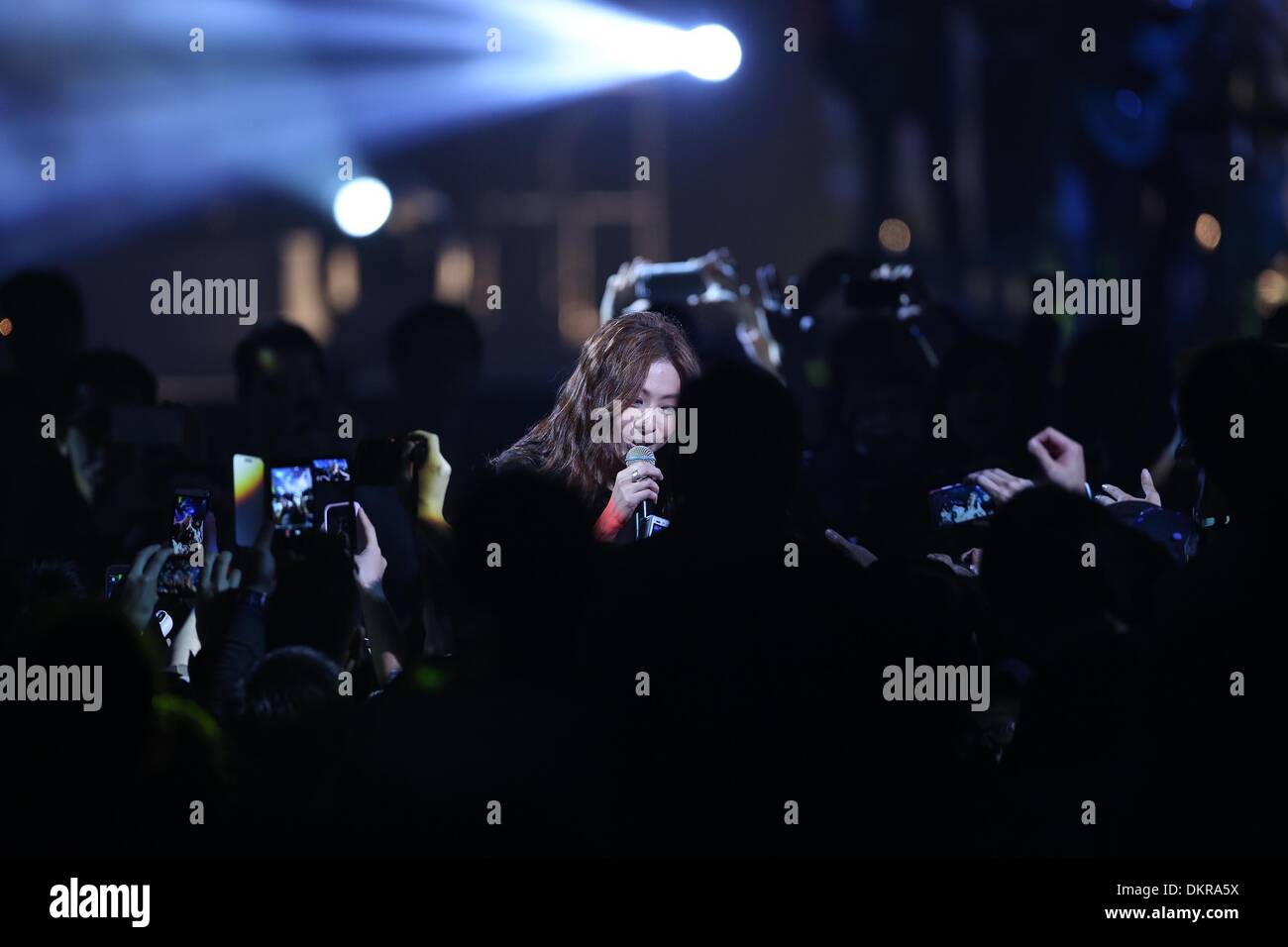 Taipei, China. 8th Dec, 2013. Singer Cheer Chan performs at her concert ...