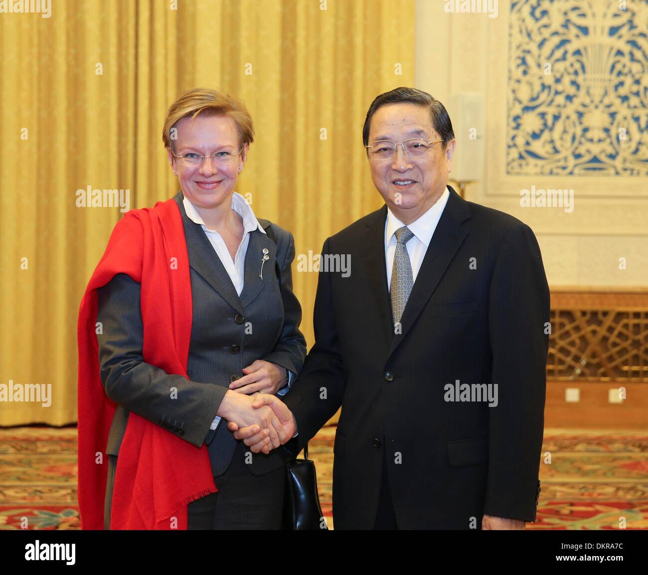 Beijing, China. 9th Dec, 2013. Yu Zhengsheng (R), chairman of the National Committee of the Chinese People's Political Consultative Conference (CPPCC), meets with Paivi Lipponen, chairwoman of the Finnish Parliament's Committee for the Future, in Beijing, capital of China, Dec. 9, 2013. © Ding Lin/Xinhua/Alamy Live News Stock Photo