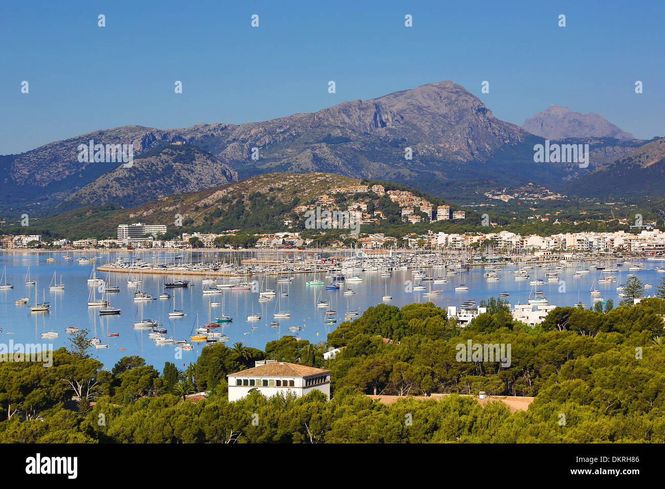 Mallorca Balearics Pollensa bay boats calm harbour island landscape morning port rocks Spain Europe touristic travel yacht Stock Photo