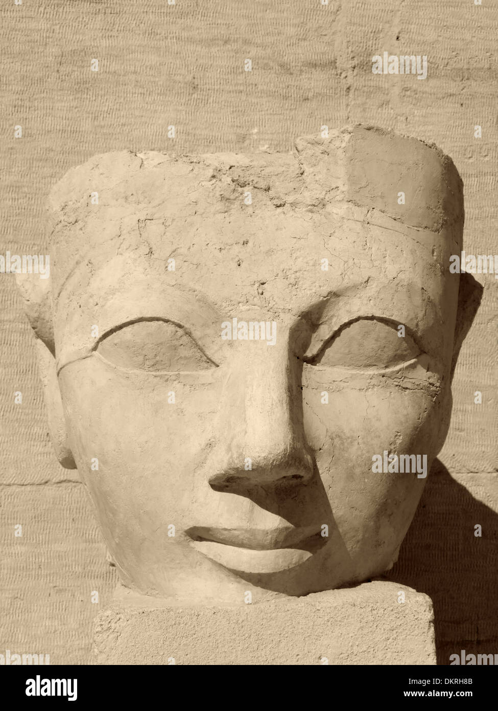 historic stone sculpture in Egypt showing the face of Hatschepsut in sunny ambiance Stock Photo