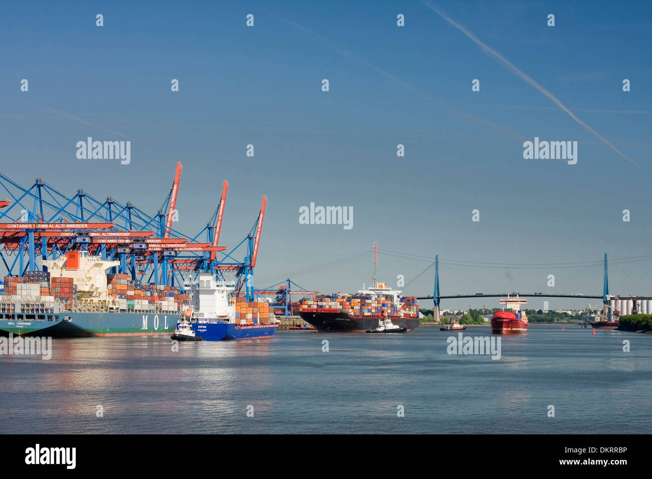 Altenwerder container port container ships container terminal Germany Europe shipping transport Köhlbrandbrücke bridge Stock Photo