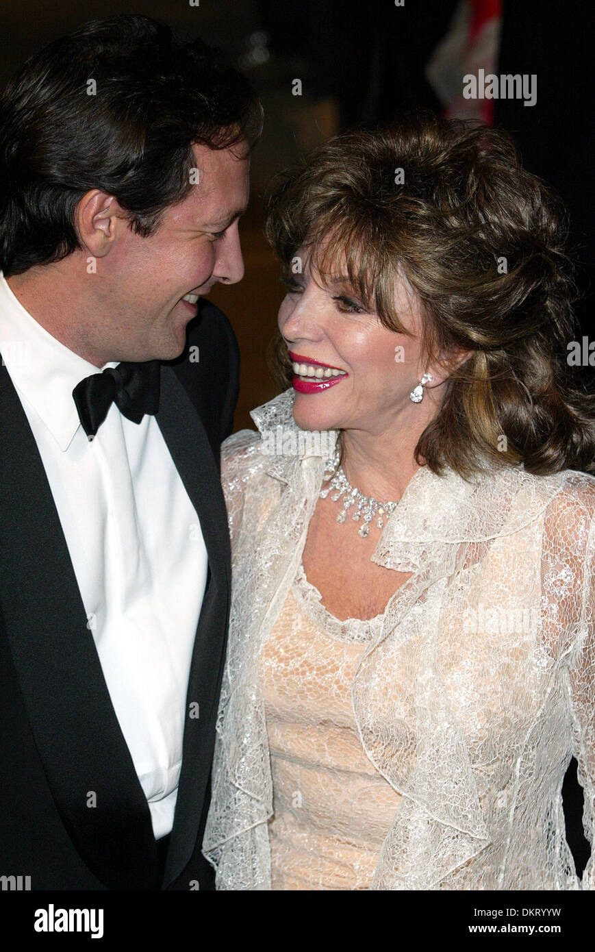 JOAN COLLINS & PERCY GIBSON.ACTRESS & HUSBAND.A.BEVERLY HILLS, LOS
