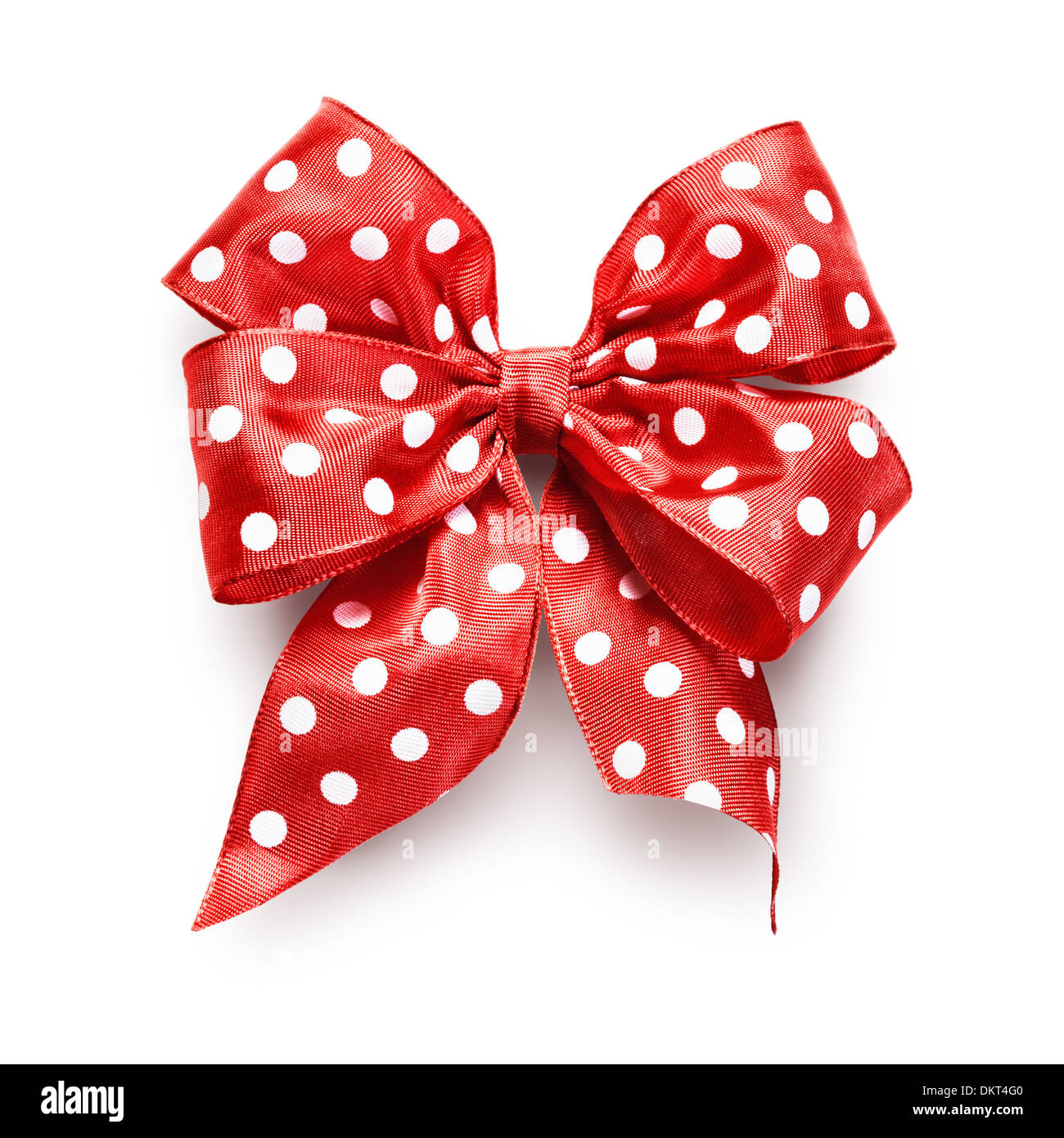 Polka dot red ribbon bow isolated on white background clipping path included Stock Photo