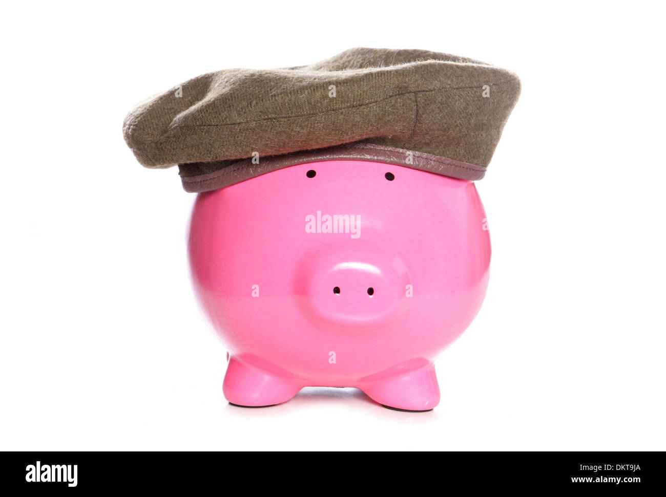 piggy bank wearing an army beret studio cutout Stock Photo