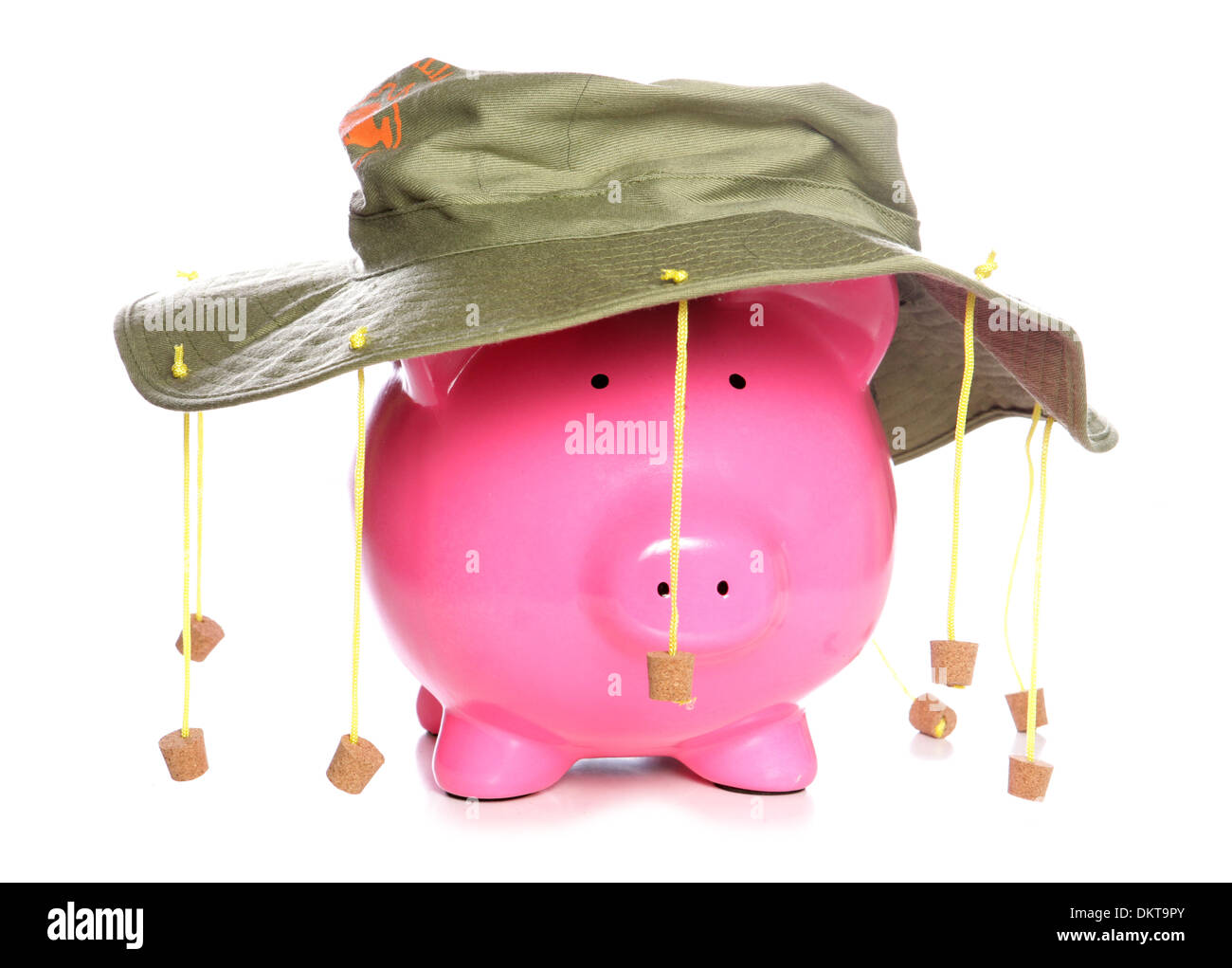 Piggy bank wearing an Australian cork hat studio cutout Stock Photo