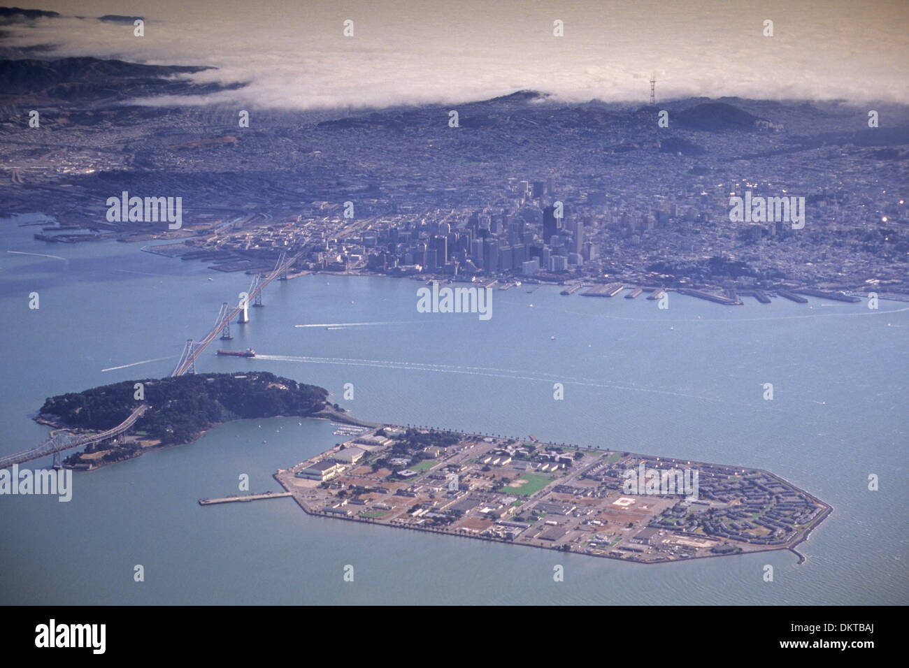 Aerial over Treasure Island, San Francisco Bay, and downtown San