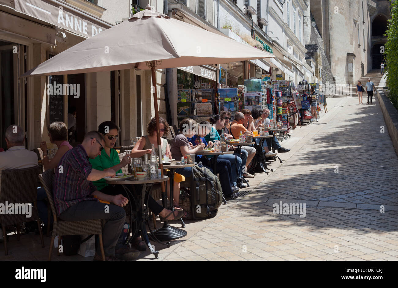 Amboise, France, in summertime. People sitting outside restaurant in