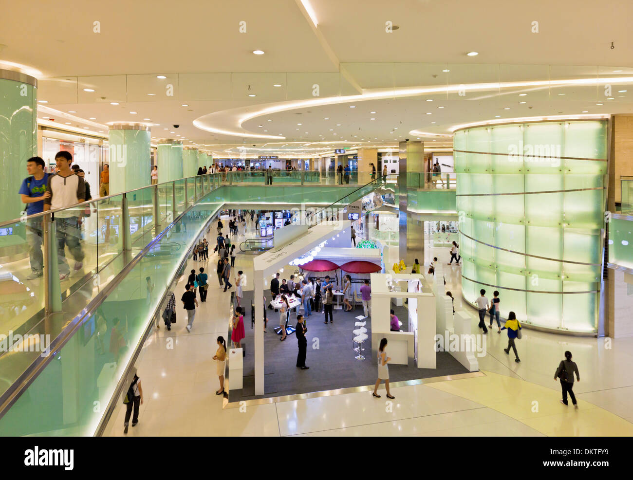 Interior of a large modern shopping mall on Wangfujing street dajie Beijing city centre center PRC people's republic of china Stock Photo