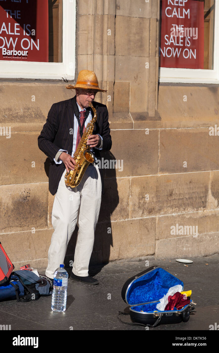 Saxophone player in Edinburgh Stock Photo Alamy