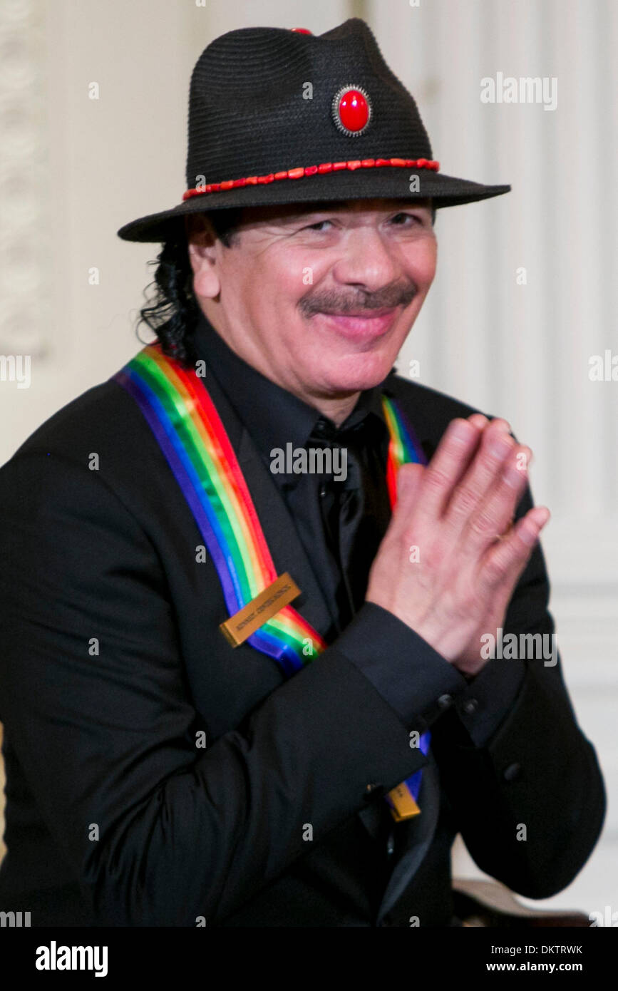 Washington, DC. 8th Dec, 2013. Kennedy Center Honoree Carlos Santana attends a reception at the White House for the 2013 Kennedy Center Honorees on December 8, 2013 in Washington, DC. Credit: Kristoffer Tripplaar / Pool via CNP/dpa/Alamy Live News Stock Photo