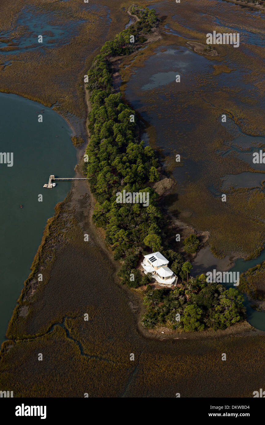 Aerial view of a remote home built on a small island in the marsh Charleston, SC. Stock Photo