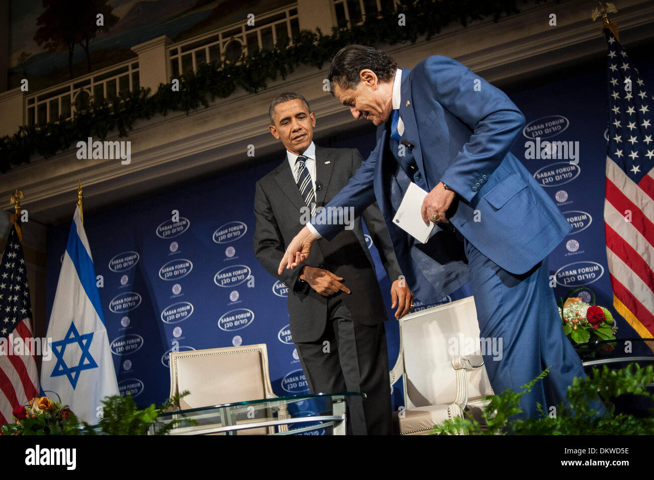 Washington, DC. 7th Dec, 2013. United States President Barack Obama arrives with Saban Forum Chairman Haim Saban at the 10th annual Saban Forum, 'Power Shifts: U.S.-Israel Relations in a Dynamic Middle East' at the Willard Hotel on December 7, 2013 in Washington, DC. Obama defended the nuclear agreement with Iran and took questions from the audience. Credit: Pete Marovich / Pool via CNP - AFP OUT/dpa/Alamy Live News Stock Photo