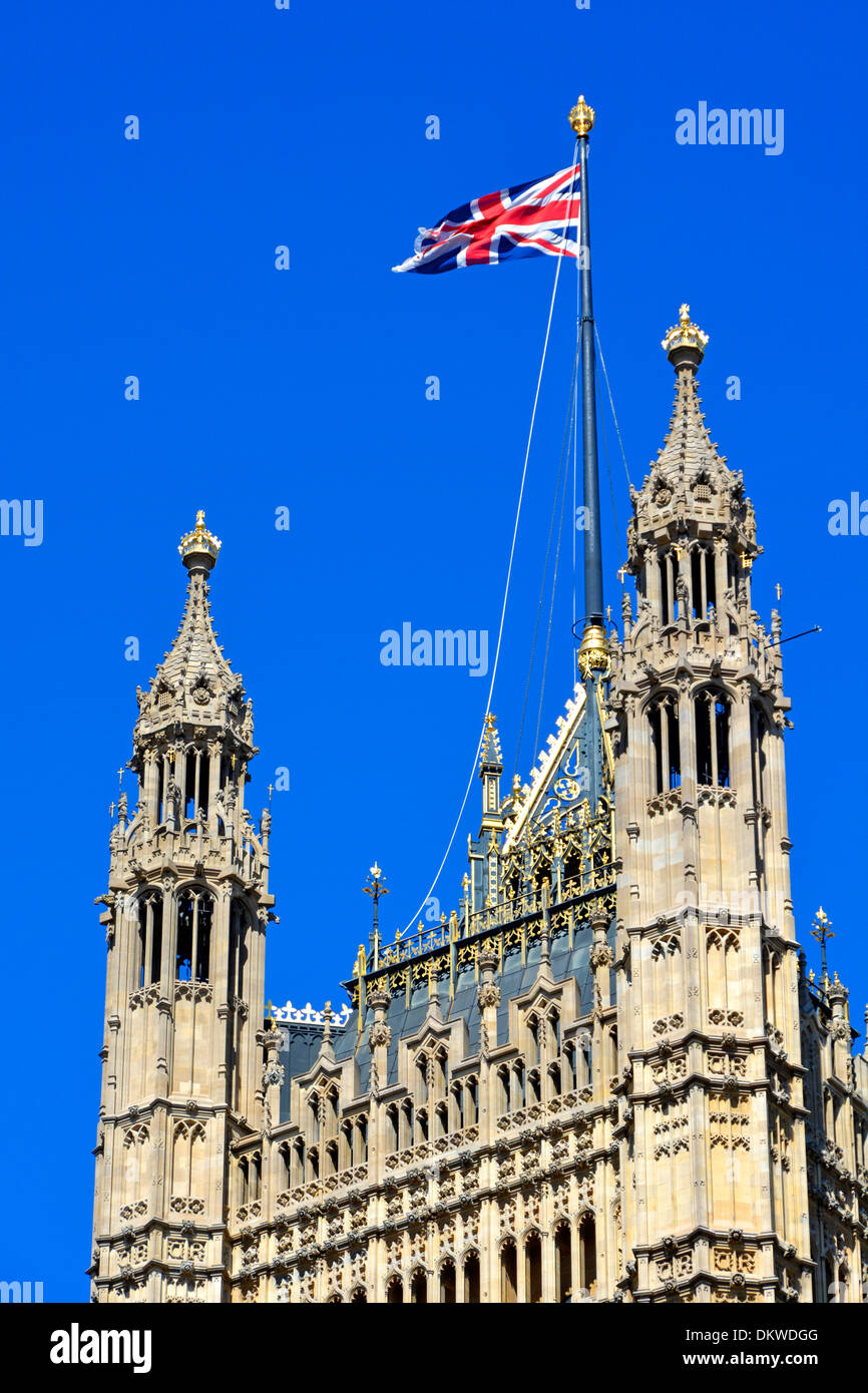 Union flag flying from the top of the Victoria Tower at the Houses of Parliament Stock Photo