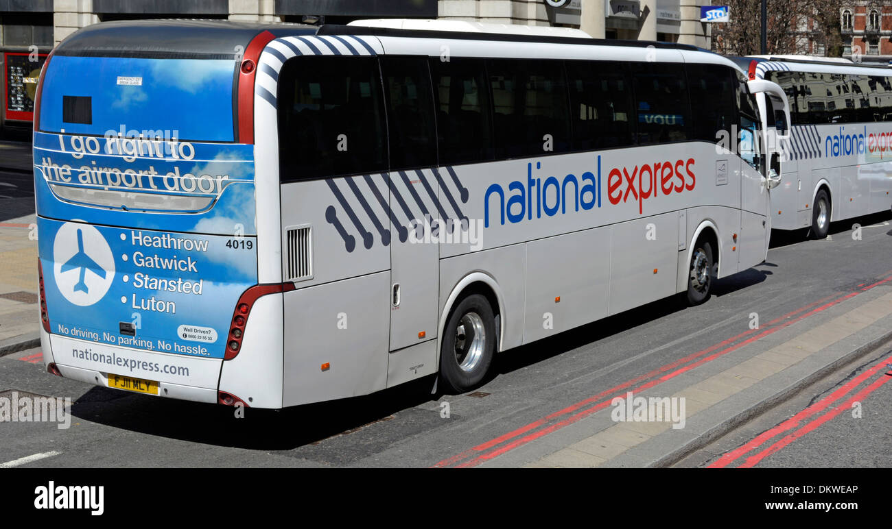 National Express coaches with advertising for services to London Airports Stock Photo