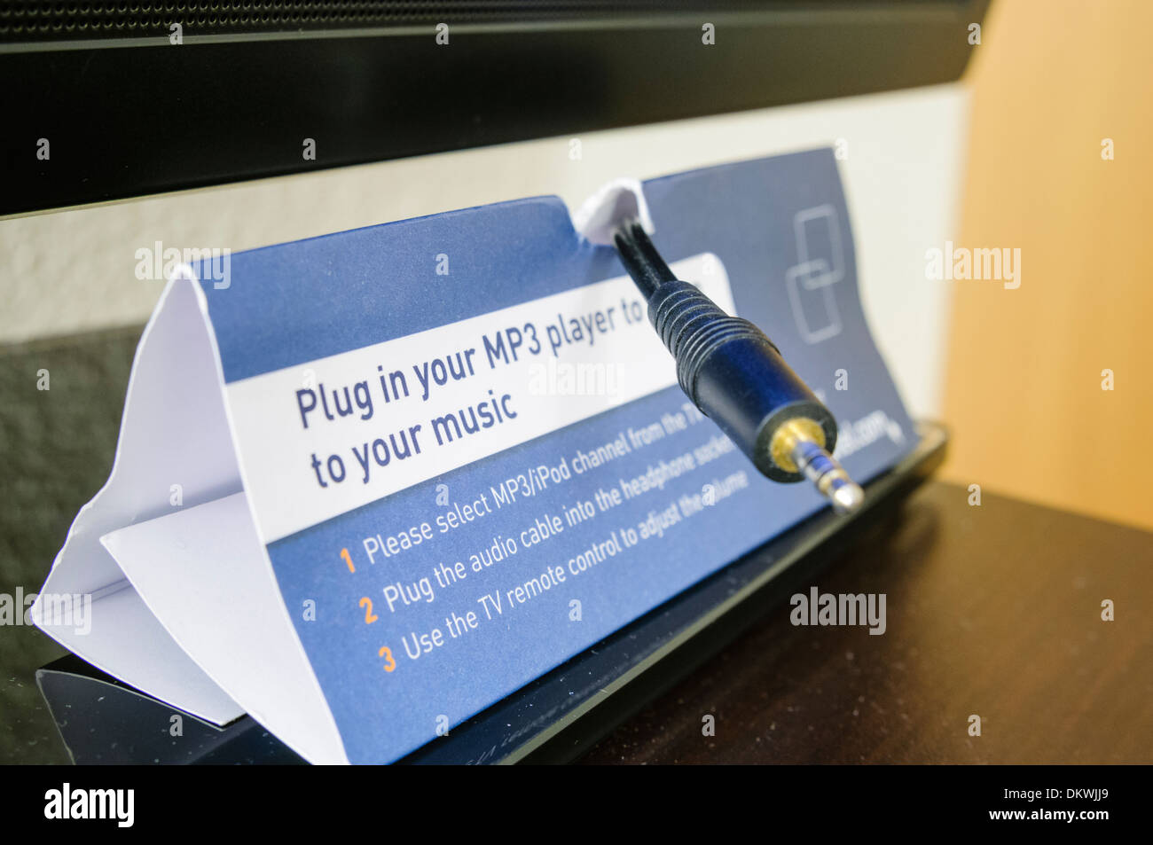 Facility in a Novotel hotel room to allow guests to plug in their MP3  player and allow them to listen via the television Stock Photo - Alamy