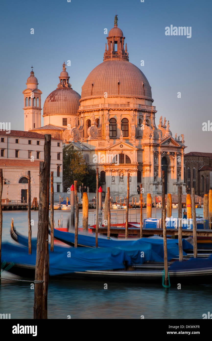 First light of sunrise against the Santa Maria della Salute Church, Venice Italy Stock Photo