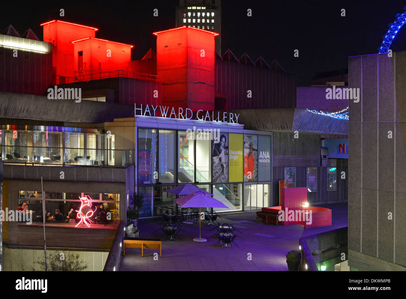 Colourful floodlighting on Hayward Art Gallery & adjacent South Bank buildings exterior winter view night Southbank Centre Lambeth London England UK Stock Photo