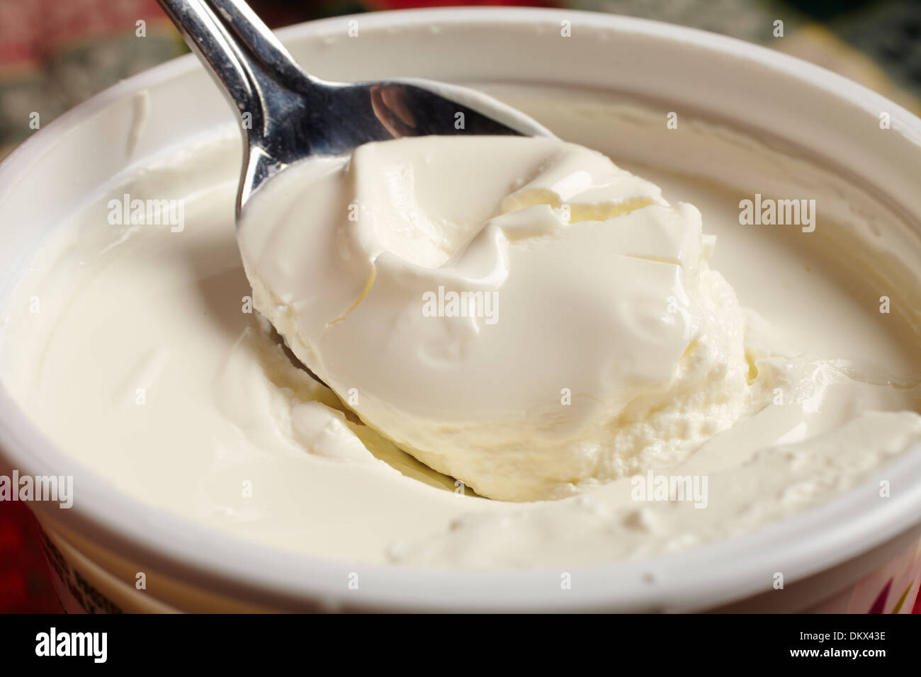 A spoonful of fresh sour cream Stock Photo