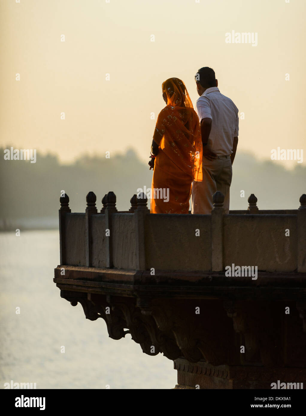 Mathura, Indian couple watching sunrise on Holi. Stock Photo