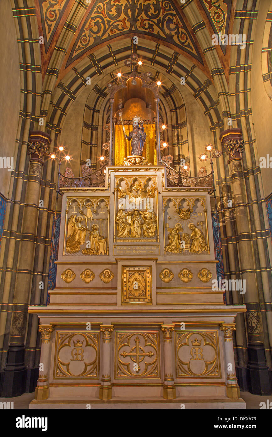 ANTWERP, BELGIUM - SEPTEMBER 5: Carved altar with the reliefs from 19. cent. from side chapel of Joriskerk Stock Photo