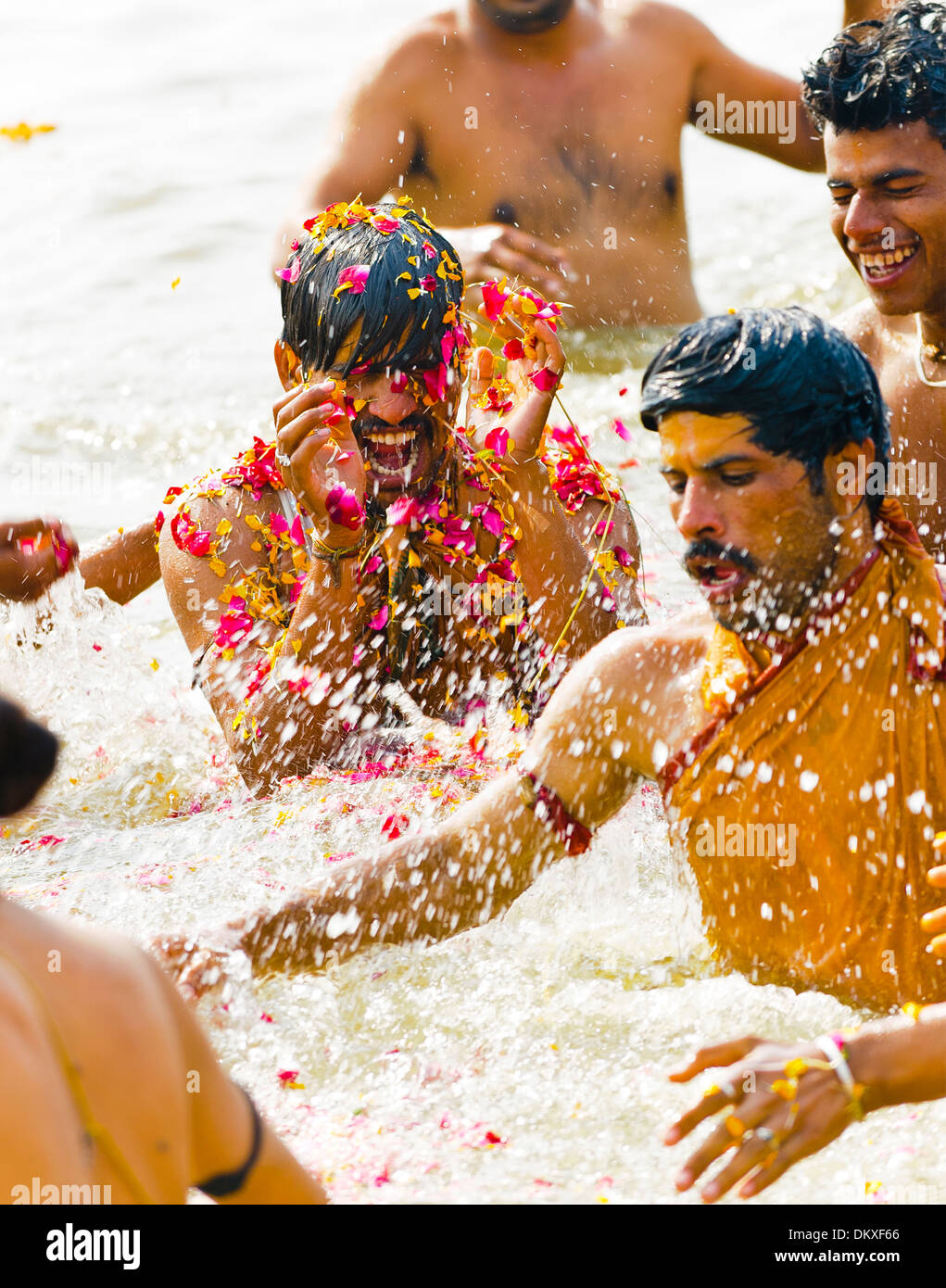 Indian Men Bathing In Ganges Kumbh Mel