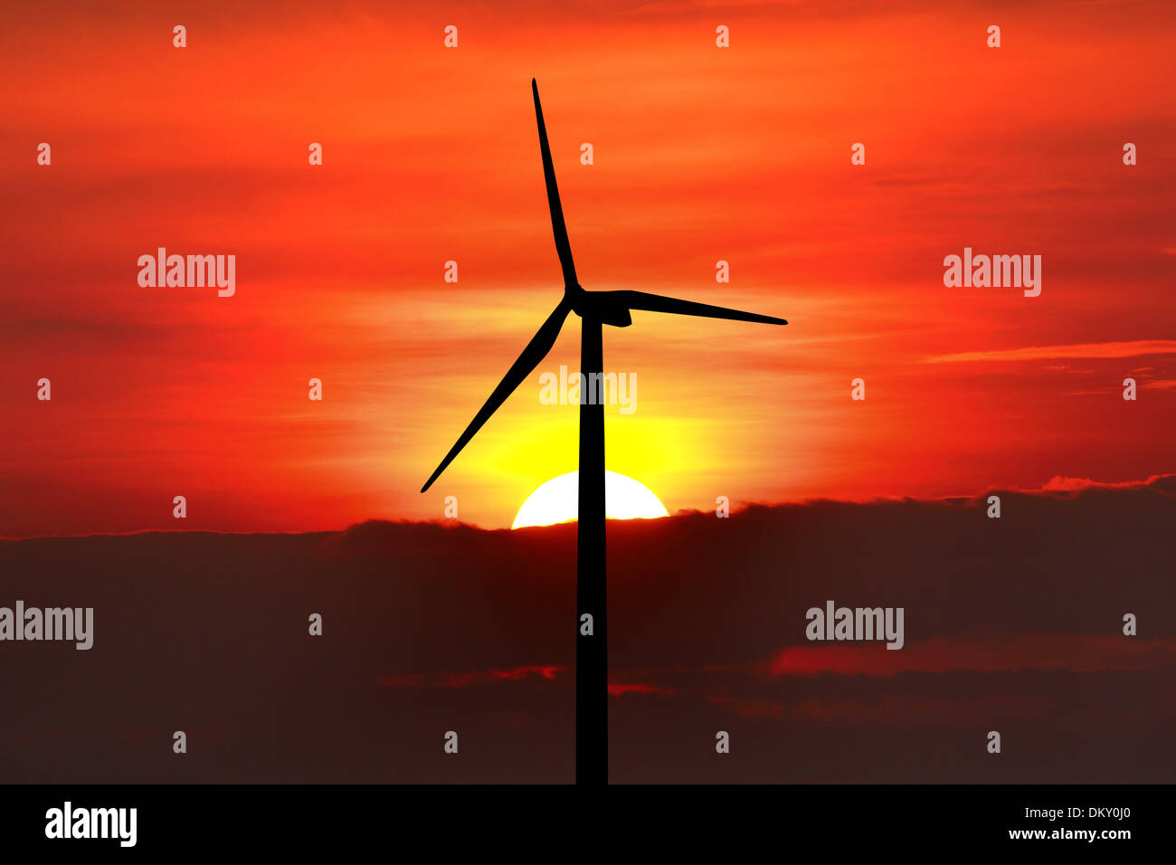 Wind turbine silhouette on sunset background Stock Photo - Alamy