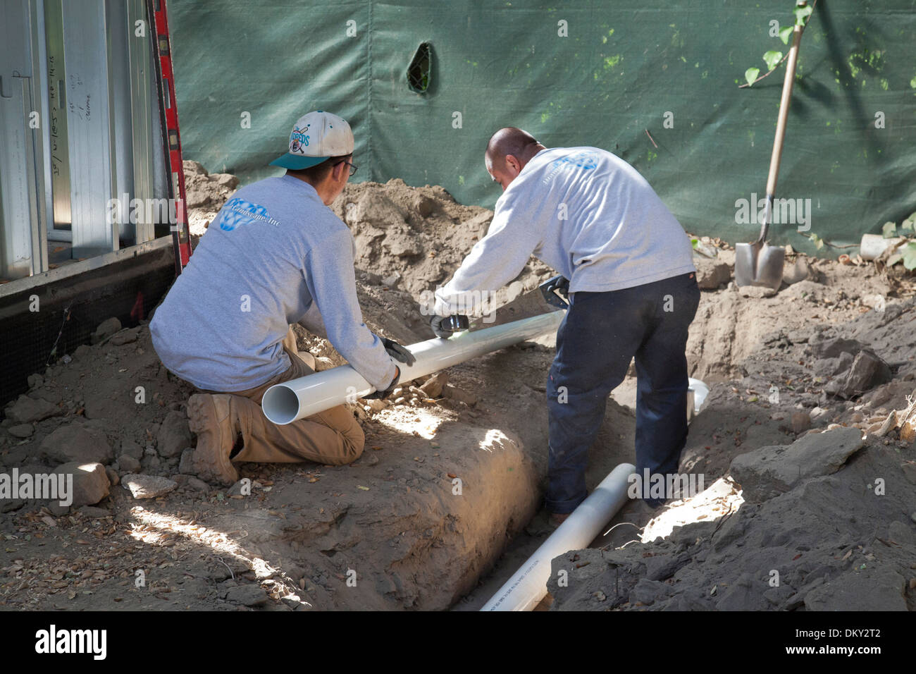 Poly Vinyl Chloride (PVC) Pipes being installed for rainwater